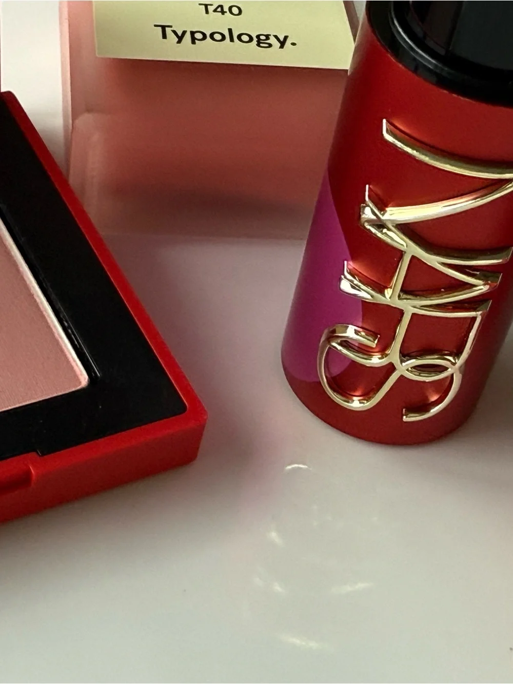 NARS Blush & Lipstick + Typology Lip Oil + Huda Puff